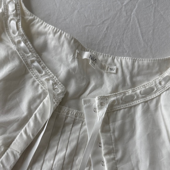 NIA REVOLVE Elegant White Sleeveless Top - Picture 4 of 4